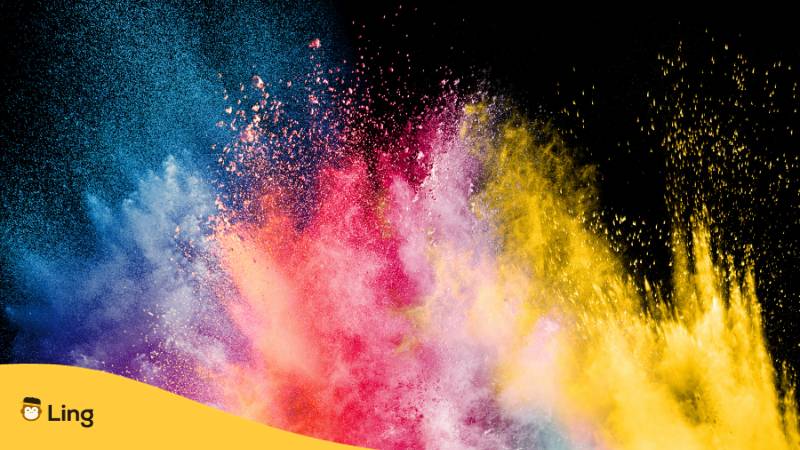 Bunte Farben wie indigo, türkis und koralle explodieren im Nachthimmel